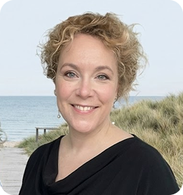 Lone Forland smiling near water